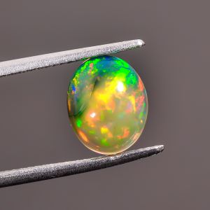 Splendid Top Grade Quality 100% Natural Black Ethiopian Opal Oval Shape Cabochon Loose Gemstone For Making Jewelry 10X8X3 mm 1.4 Ct. SN-247