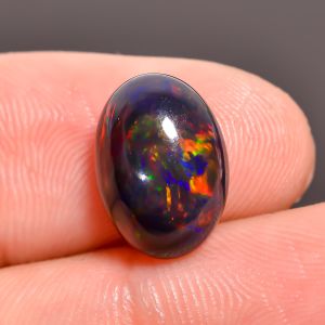 Splendid Top Grade Quality 100% Natural Black Ethiopian Opal Oval Shape Cabochon Loose Gemstone For Making Jewelry 12X9X5 mm 2.95 Ct. SN-482