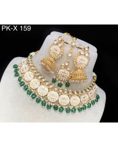 Buy Traditional Designer Wedding gold Plated Green Kundan Necklace Set With earrings & Maangtika 