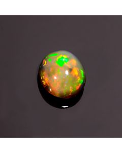 Amazing A One Quality 100% Natural Multi Fire Black Ethiopian Opal Oval Shape Cabochon Gemstone For Making Jewelry 6.15 Ct. 14X12X7 mm 