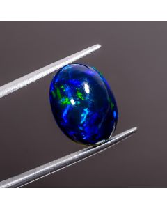 Gorgeous Top Grade Quality 100% Natural Multi Fire Black Ethiopian Opal Oval Shape Cabochon Gemstone For Making Jewelry 14X10X6 mm 4.15 Ct. 