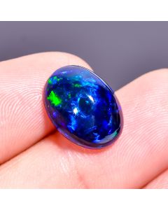 Immaculate Top Grade Quality 100% Natural Multi Fire Black Ethiopian Opal Oval Shape Cabochon Gemstone For Making Jewelry 17X11X6 mm 5 Ct. 