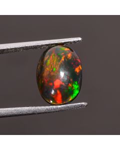 Gorgeous Top Grade Quality 100% Natural Black Ethiopian Opal Oval Shape Cabochon Loose Gemstone For Making Jewelry 12X9X4 mm 2.05 Ct. SN-349