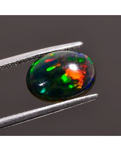 Superb Top Grade Quality 100% Natural Welo Fire Black Ethiopian Opal Oval Shape Cabochon Gemstone For Making Jewelry 11X8X3 mm 1.5 Ct SN-387