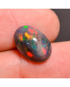 Supreme Top Grade Quality 100% Natural Welo Fire Black Ethiopian Opal Oval Shape Cabochon Gemstone For Making Jewelry 12X8X5mm 2.7 Ct SN-420