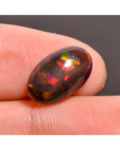 Dazzling Top Grade Quality 100% Natural Black Ethiopian Opal Oval Shape Cabochon Loose Gemstone For Making Jewelry 13X8X4 mm 2.45 Ct. SN-462