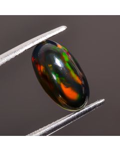 Dazzling Top Grade Quality 100% Natural Black Ethiopian Opal Oval Shape Cabochon Loose Gemstone For Making Jewelry 12X7X4 mm 1.75 Ct. SN-476