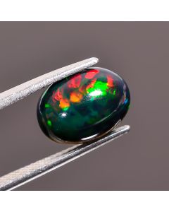 Stunning Top Grade Quality 100% Natural Welo Fire Black Ethiopian Opal Oval Shape Cabochon Gemstone For Making Jewelry 12X9X5mm 2.7 Ct SN481