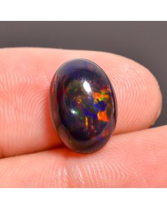 Splendid Top Grade Quality 100% Natural Black Ethiopian Opal Oval Shape Cabochon Loose Gemstone For Making Jewelry 12X9X5 mm 2.95 Ct. SN-482