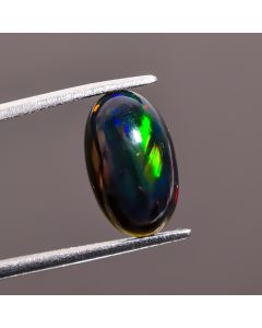 Wonderful Top Grade Quality 100% Natural Black Ethiopian Opal Oval Shape Cabochon Loose Gemstone For Making Jewelry 14X8X4 mm 2.1 Ct. SN-489