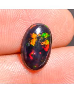 Gorgeous Top Grade Quality 100% Natural Welo Fire Black Ethiopian Opal Oval Shape Cabochon Gemstone For Making Jewelry 11X7X3mm 1.1 Ct SN502