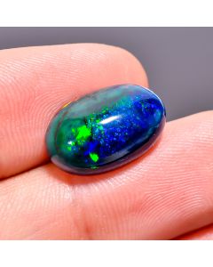 Awesome Top Grade Quality 100% Natural Multi Fire Black Ethiopian Opal Oval Shape Cabochon Loose Gemstone For Making Jewelry 16X10X6mm 4.25 Ct 