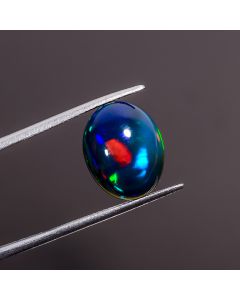 Beautiful Top Grade Quality 100% Natural Multi Fire Black Ethiopian Opal Oval Shape Cabochon Gemstone For Making Jewelry 14X11X5 mm 4.8 Ct. 