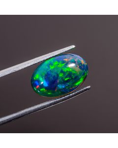 Fantastic Top Grade Quality 100% Natural Multi Fire Black Ethiopian Opal Oval Shape Cabochon Gemstone For Making Jewelry 15X10X5 mm 4.15 Ct. 