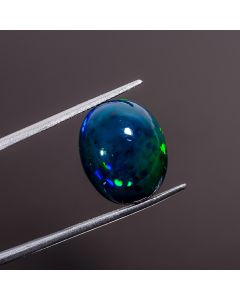 Gorgeous Top Grade Quality 100% Natural Multi Fire Black Ethiopian Opal Oval Shape Cabochon Loose Gemstone For Making Jewelry 16X13X8mm 7.8 Ct 